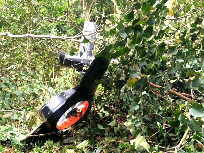 The badly damaged helicopter in a Perak forest reserve - Pix courtesy of PDRM